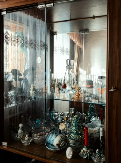 a cabinet with glass items